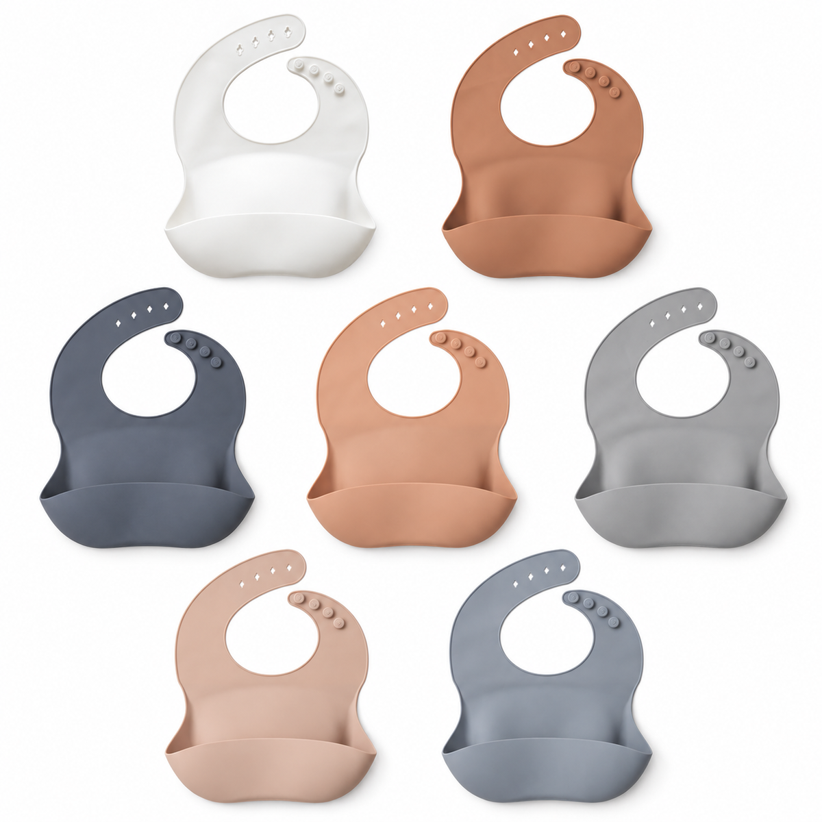 The Saturday Baby silicone bibs in Cloud, Coco, Ocean, Peach, Sage, Sand and Sky. Colors sold separately.