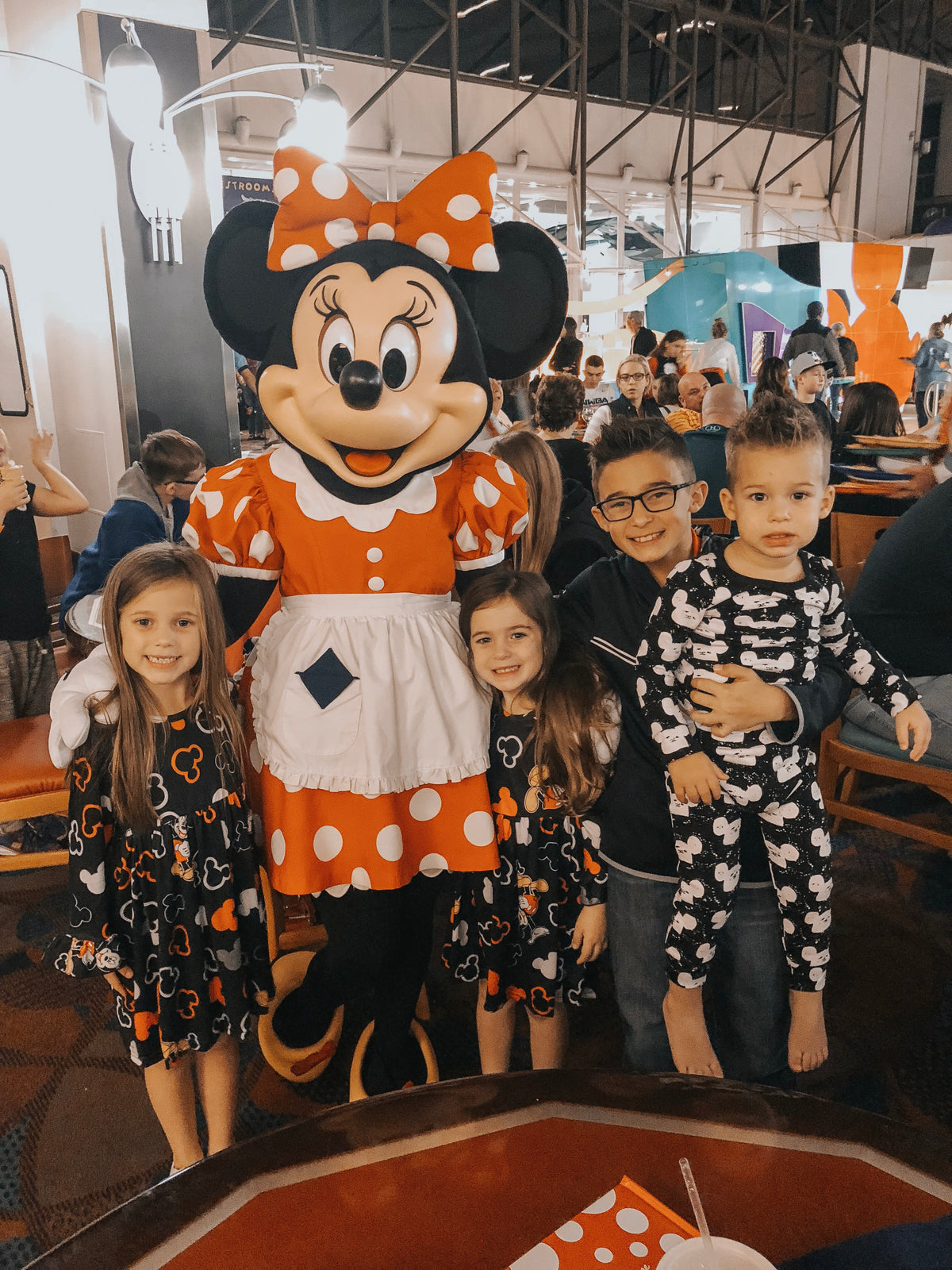 Organic Baby + Kids Pajama Set | White on Black Modern Mouse — Children wearing the print at a character display