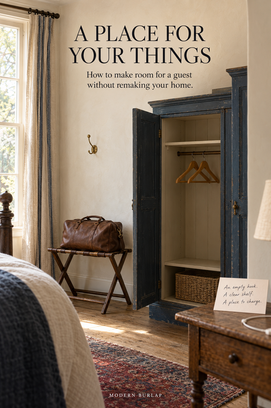 A guest room with an open wardrobe, empty hook, luggage stand and clear bedside surface. Headline: A Place for Your Things.