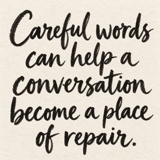 Black brush lettering on ivory handmade paper: “Careful words can help a conversation become a place of repair.”