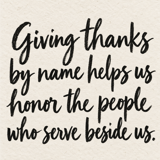 Black brush lettering on ivory handmade paper: “Giving thanks by name helps us honor the people who serve beside us.”