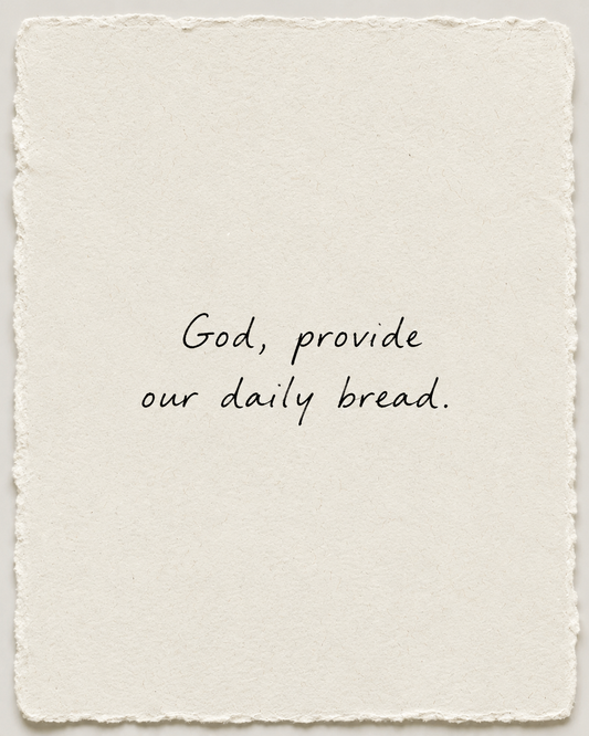 Handwritten prayer God, provide our daily bread on ivory handmade paper