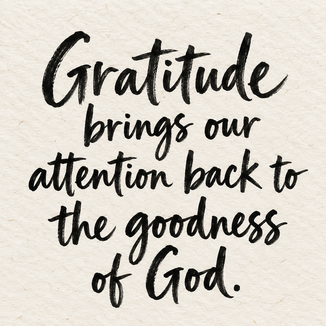Black brush lettering on ivory handmade paper: “Gratitude brings our attention back to the goodness of God.”