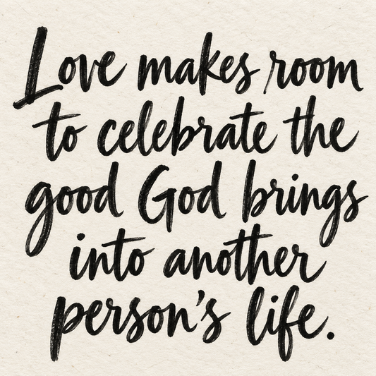 Black brush lettering on ivory handmade paper: “Love makes room to celebrate the good God brings into another person’s life.”