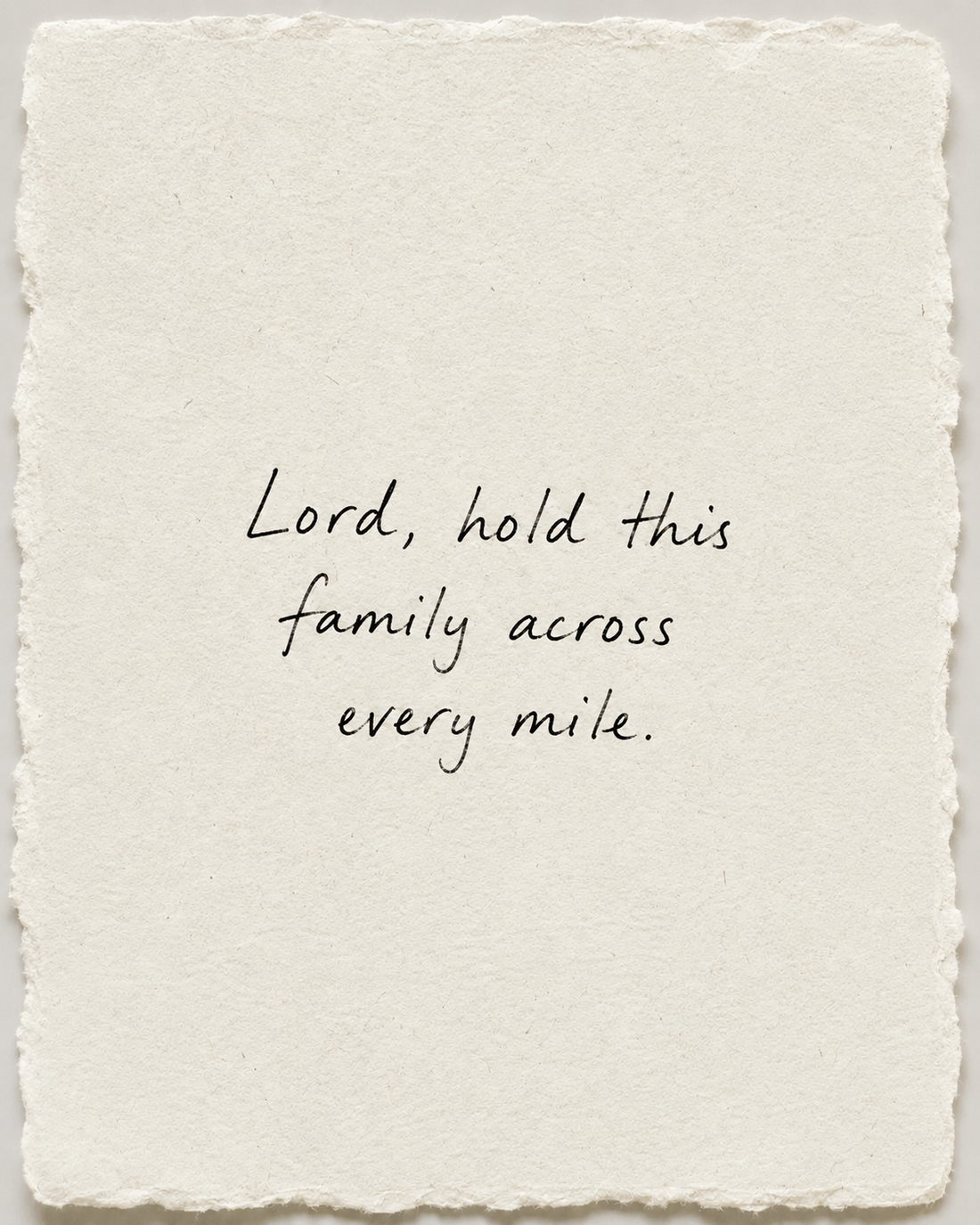 Handwritten prayer Lord, hold this family across every mile on ivory handmade paper