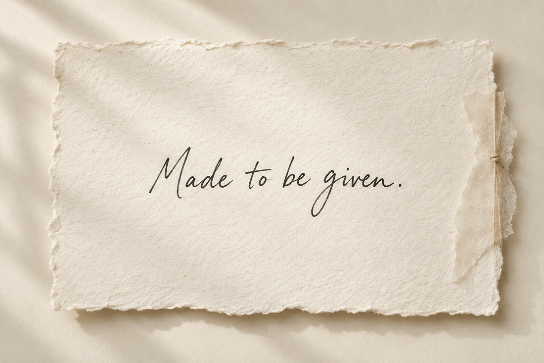 Handwritten artwork on ivory handmade paper reading Made to be given.