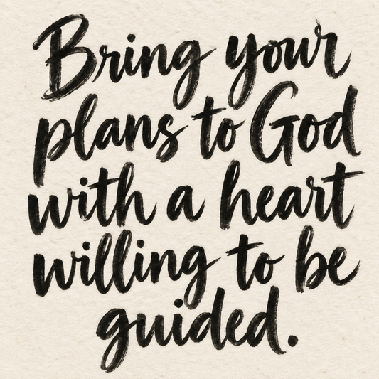 Black brush lettering on ivory handmade paper: “Bring your plans to God with a heart willing to be guided.”