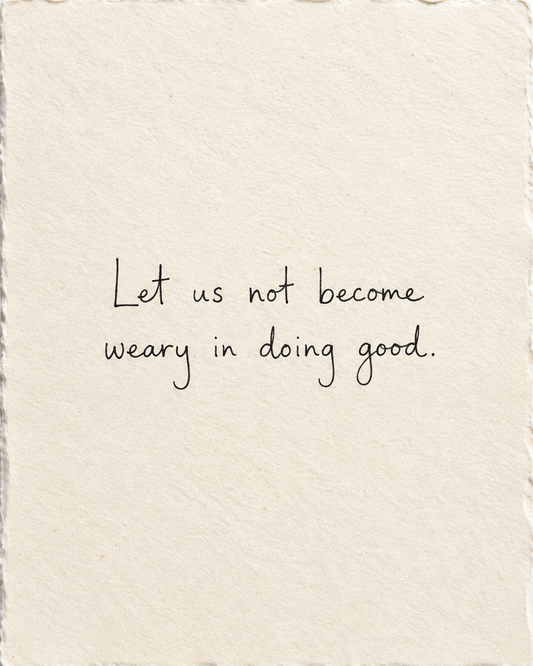 Let us not become weary in doing good, handwritten in black ink on ivory handmade paper