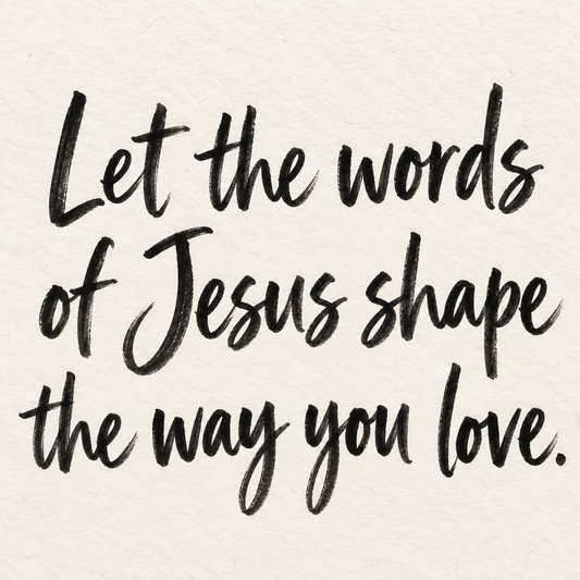 Black brush lettering on ivory handmade paper: “Let the words of Jesus shape the way you love.”