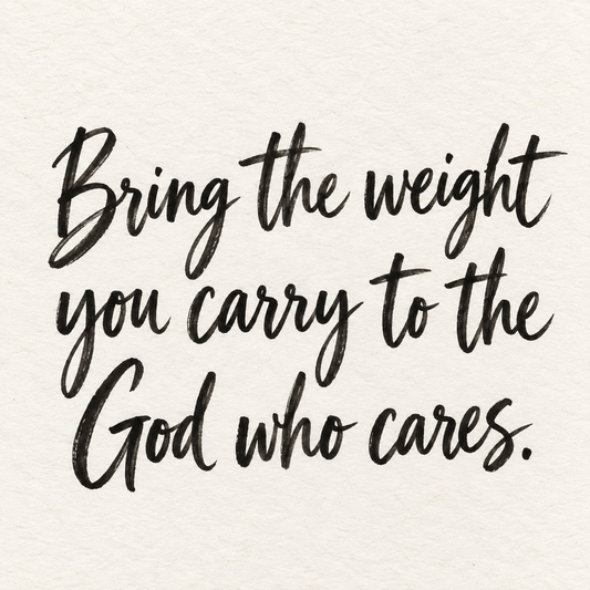 Black brush lettering on ivory handmade paper: “Bring the weight you carry to the God who cares.”