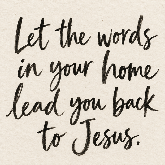 Black brush lettering on ivory handmade paper: “Let the words in your home lead you back to Jesus.”