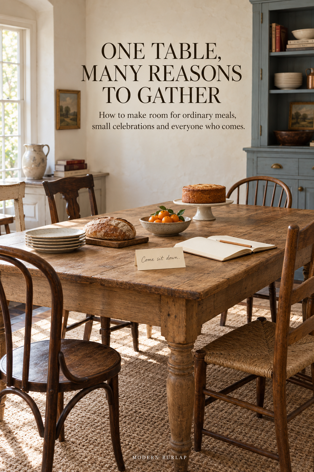 A collected oak table with varied chairs, everyday plates, bread, clementines, a notebook and a small cake beneath the headline One Table, Many Reasons to Gather.