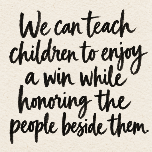 Black brush lettering on ivory handmade paper: “We can teach children to enjoy a win while honoring the people beside them.”