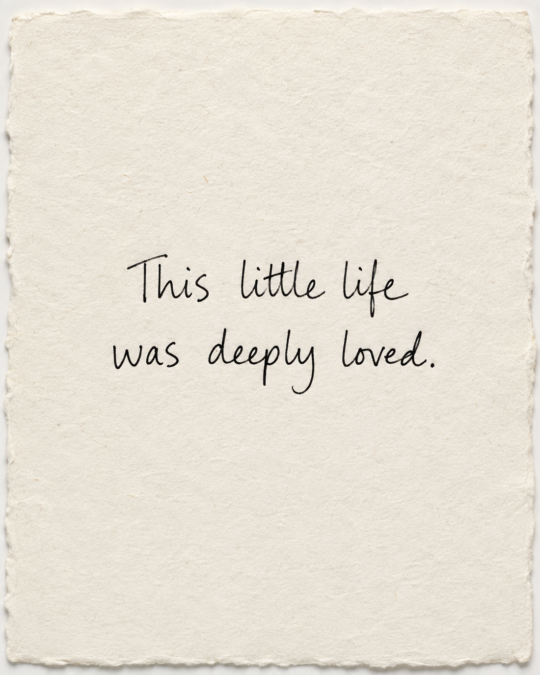 Handwritten artwork on ivory handmade paper: This little life was deeply loved.
