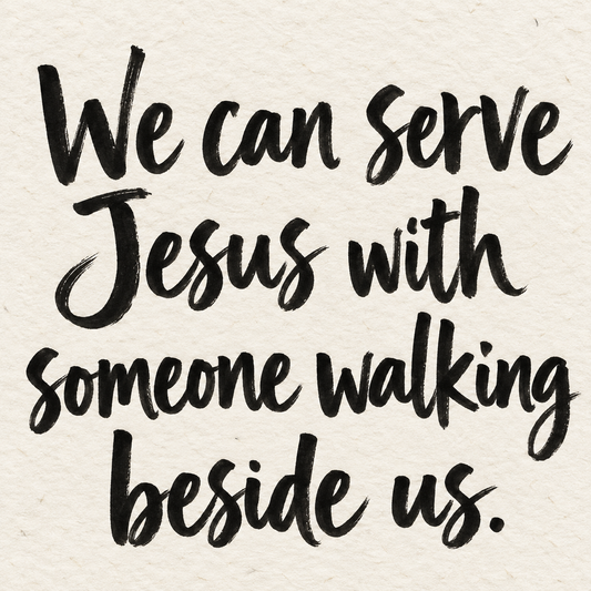 Black brush lettering on ivory handmade paper: “We can serve Jesus with someone walking beside us.”