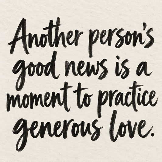 Black brush lettering on ivory handmade paper: “Another person’s good news is a moment to practice generous love.”