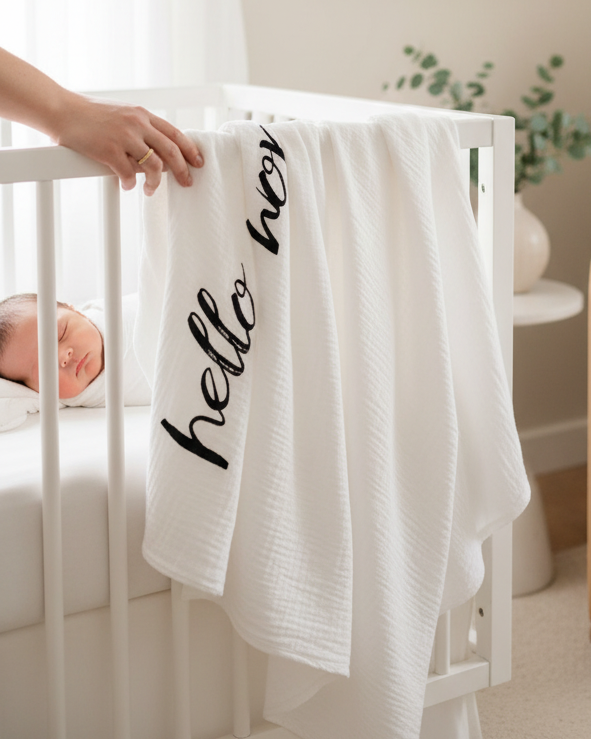 Hello World organic cotton muslin swaddle by Modern Burlap