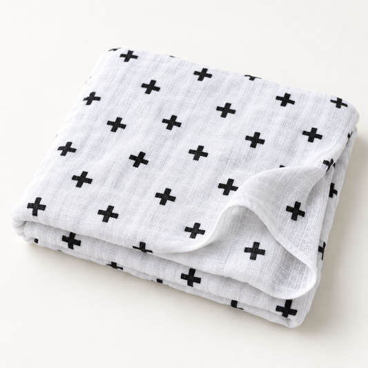 Folded Swiss Cross Organic Swaddle.