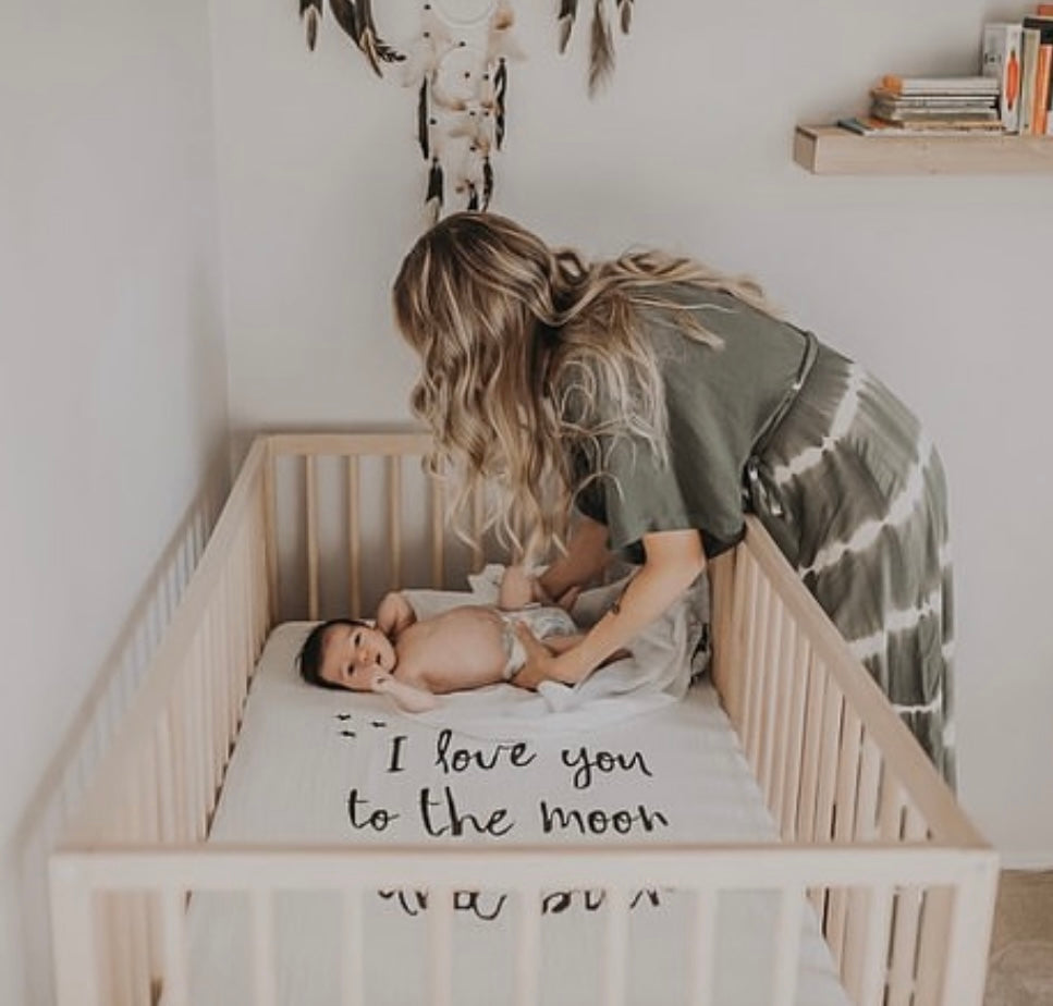 Love you to the moon and store back crib sheet