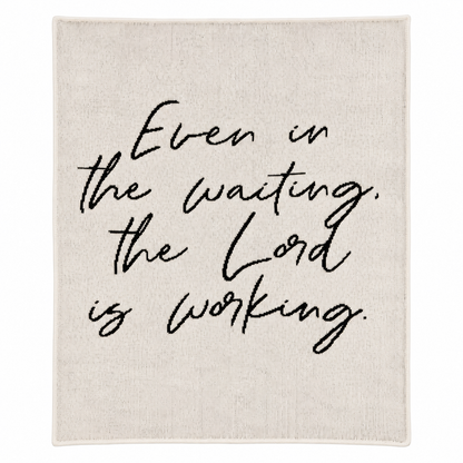 Even in the Waiting the Lord Is Working Natural knit blanket — full centered studio view on white.