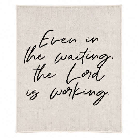 Even in the Waiting the Lord Is Working Natural knit blanket — full centered studio view on white.