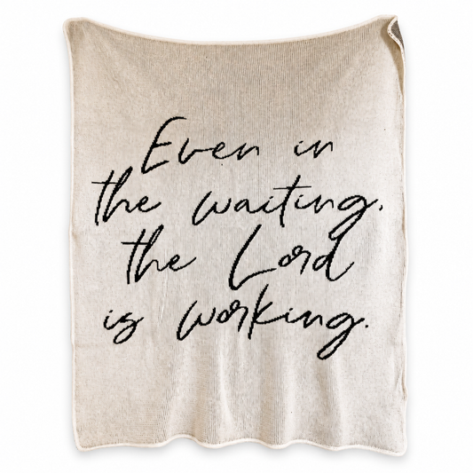 Even in the Waiting the Lord Is Working Recycled Cotton Throw Blanket — Natural color, full blanket view showing the original knitted design and finished edges.