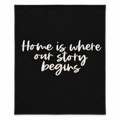 Home Is Where Our Story Begins knit throw in Black, full studio view.