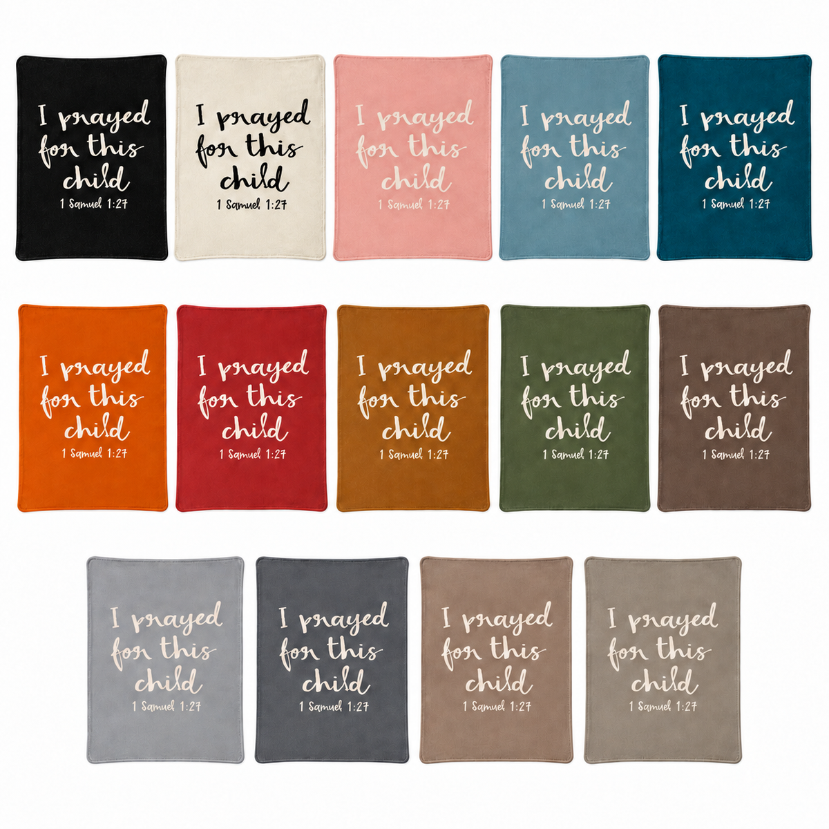 I Prayed for This Child recycled cotton blankets in all 14 colors, arranged together on white. One blanket per purchase.