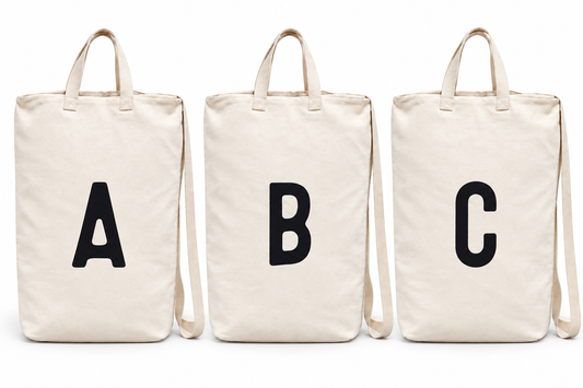 A, B and C initial canvas bags shown at equal scale on white; choose any letter A to Z, bags sold individually