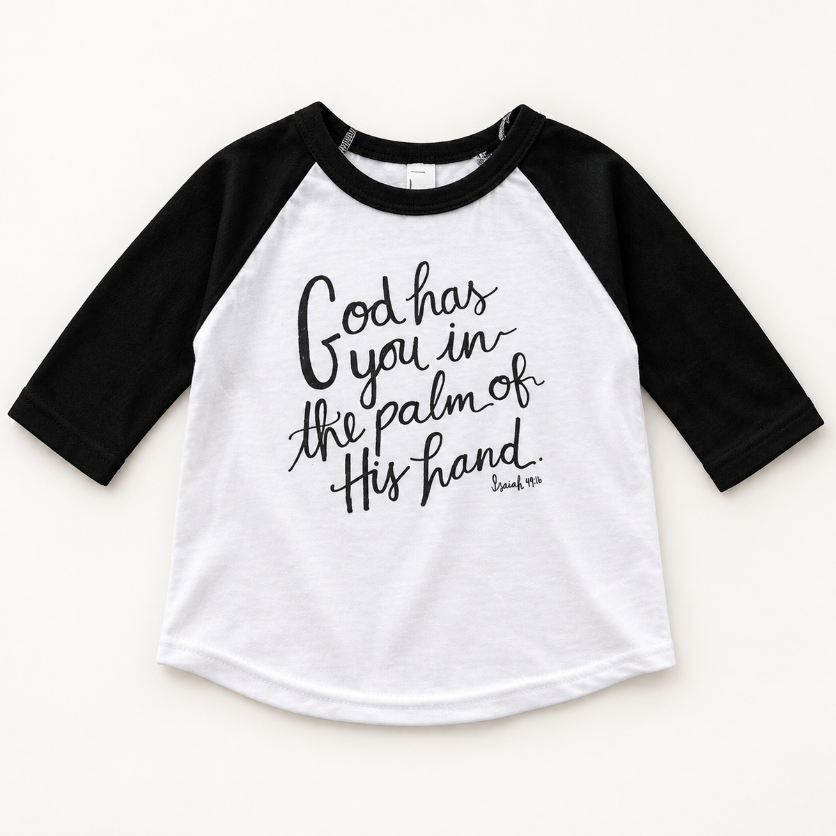 Isaiah 49:16 black and white kids raglan tee, front studio view