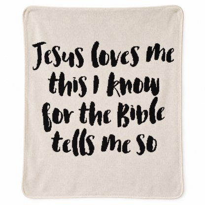 Jesus Loves Me Classic knit throw in Natural, showing the complete black lettering and blanket edges on white.