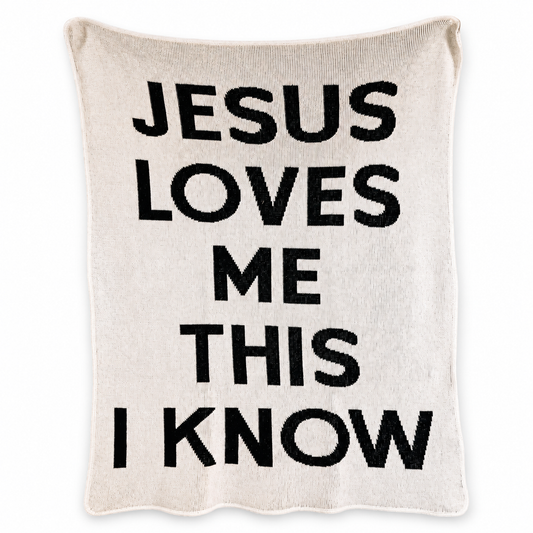 Jesus Loves Me Recycled Cotton Throw Blanket | Block Lettering — Natural color, full blanket view showing the original knitted design and finished edges.