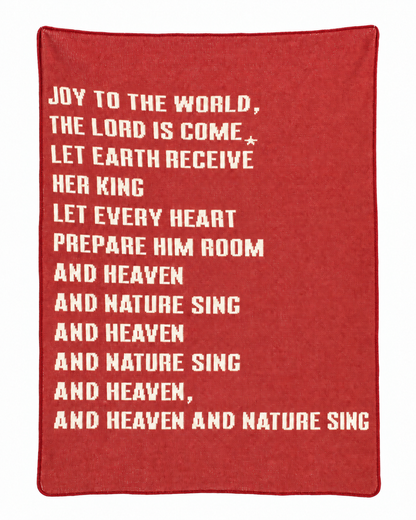 Joy to the World recycled cotton blanket in Rust Red, full design on white.