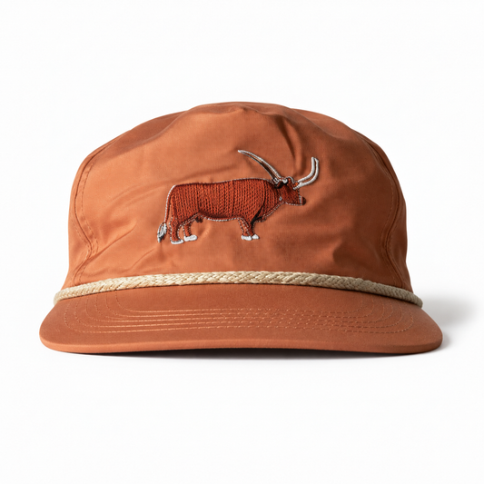 Lischka Brothers burnt orange Longhorn rope cap, full front view with cream rope and embroidered longhorn