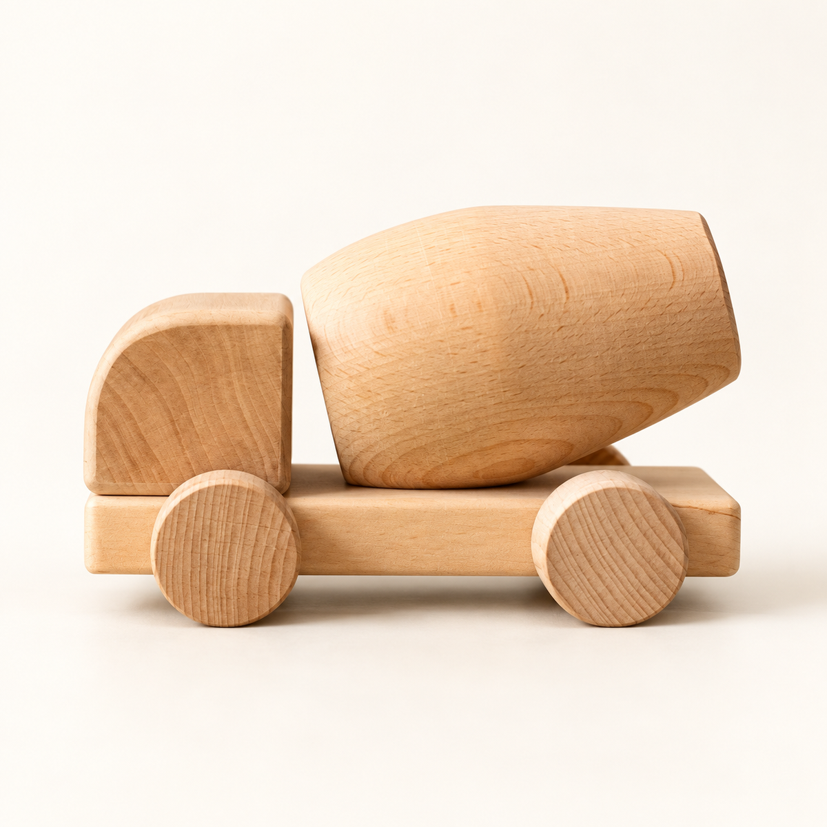 Liswood unpainted wooden concrete mixer on a warm white background, side view.