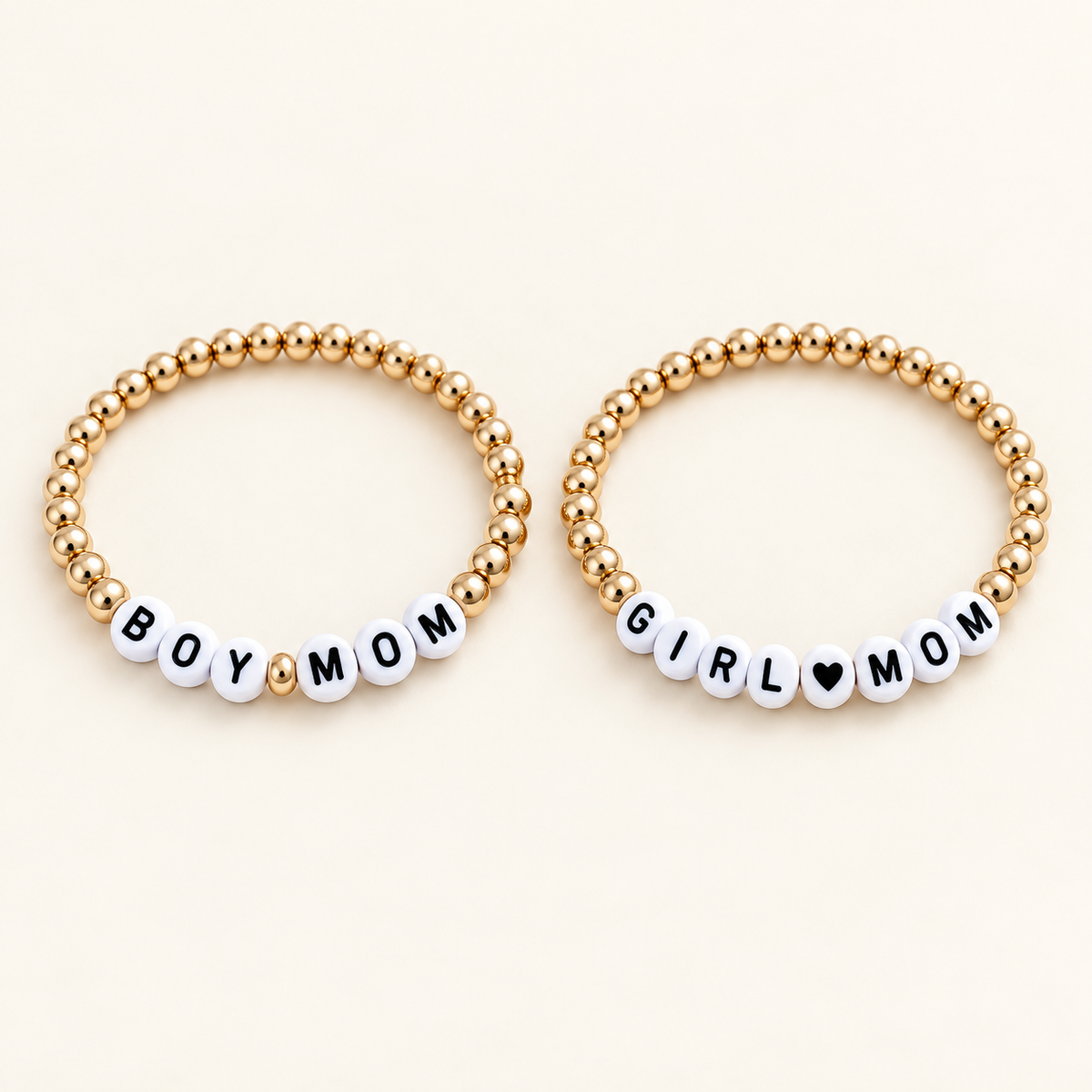LOLA MAGNOLIA Boy Mom and Girl Mom bracelets, sold separately.