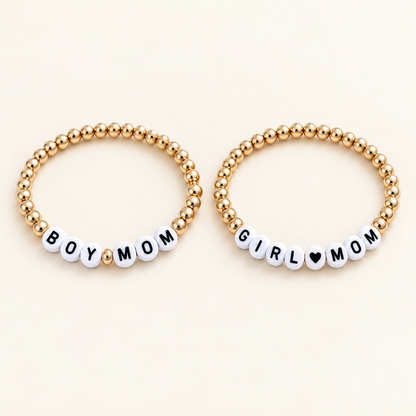 LOLA MAGNOLIA Boy Mom and Girl Mom bracelets, sold separately.