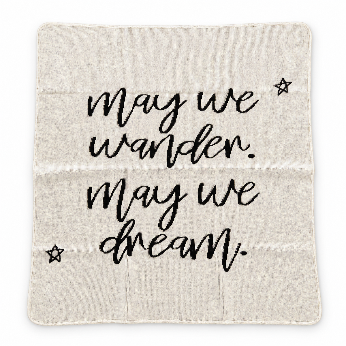 Natural May We Wander May We Dream blanket with script lettering and stars, shown fully extended on a white background.