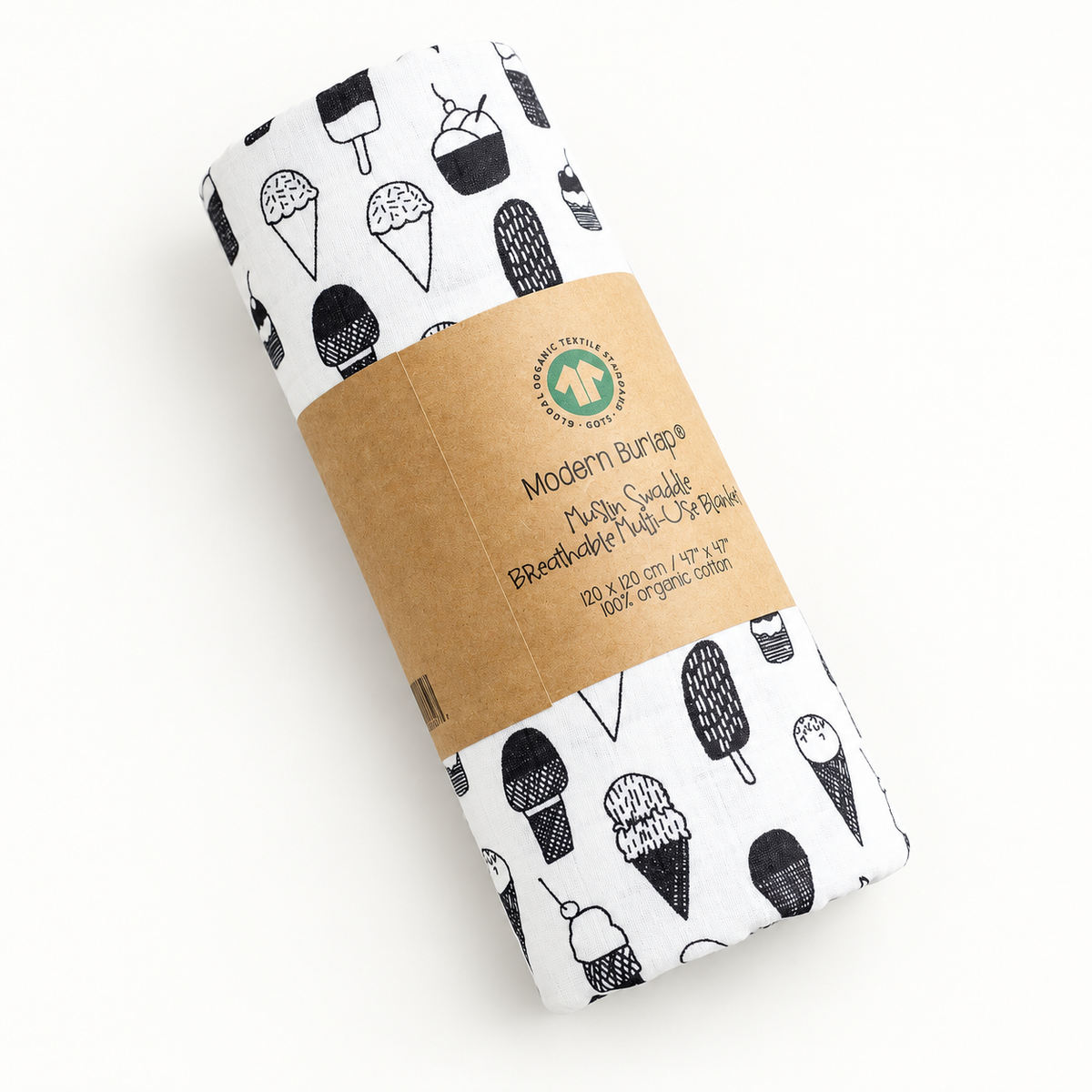 Mini Ice Cream Love organic muslin swaddle rolled in its original kraft packaging.