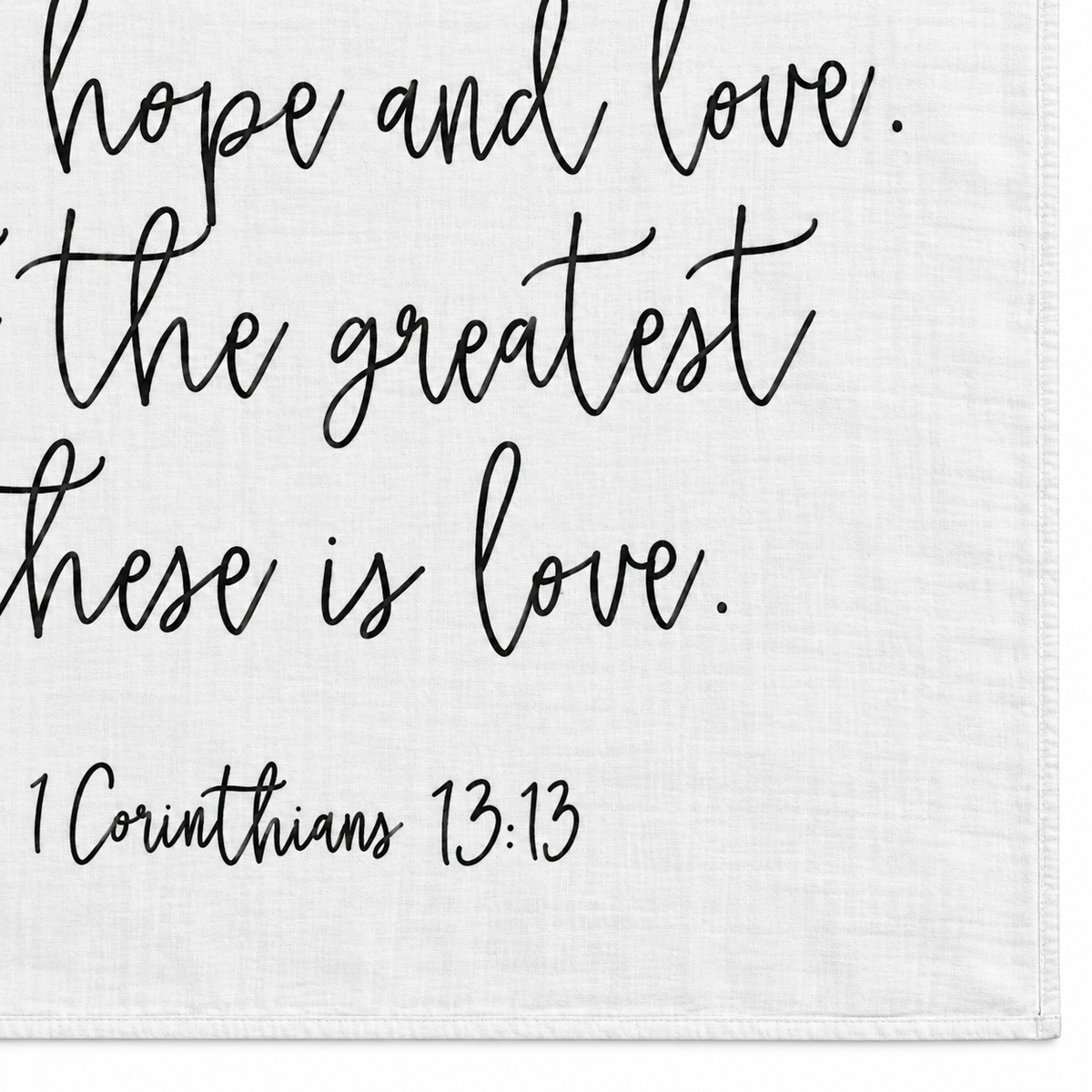 1 Corinthians 13:13 Scripture swaddle detail showing the printed lettering and hem.