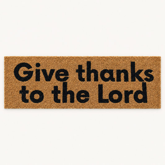 Give Thanks to the Lord | XL Christian Doormat shown alone on a warm off-white studio background.
