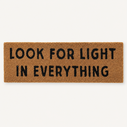 Look for Light in Everything XL doormat design, available as an opened showroom sample.