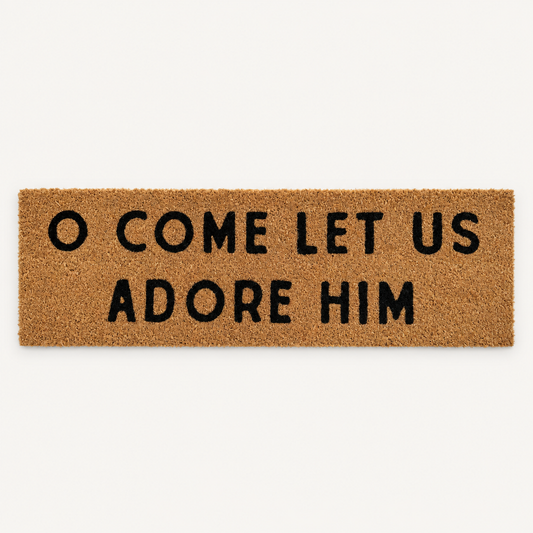 O Come Let Us Adore Him | XL Christian Doormat shown alone on a warm off-white studio background.
