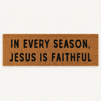 In Every Season, Jesus Is Faithful | XL Christian Doormat shown alone on a warm off-white studio background.