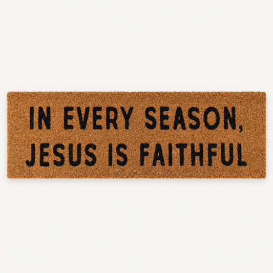 In Every Season, Jesus Is Faithful | XL Christian Doormat shown alone on a warm off-white studio background.