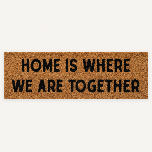 Home Is Where We Are Together | XL Doormat shown alone on a warm off-white studio background.