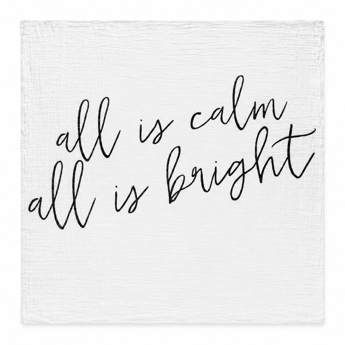 All Is Calm All Is Bright organic muslin swaddle laid fully open on white, showing the original black handwritten lettering and square stitched edges.