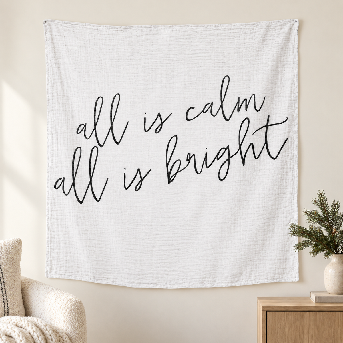 All Is Calm All Is Bright organic muslin swaddle displayed as wall art. AI-styled room; furniture and decorations not included.