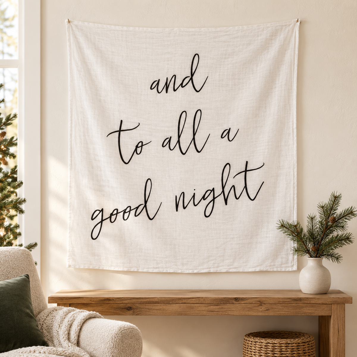 And to all a good night organic muslin swaddle displayed on a living room wall. AI-styled room; furniture and decorations are not included.