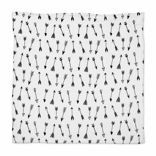 Arrows organic cotton muslin swaddle laid fully open on white, showing the square shape, original black arrow print and stitched edges.